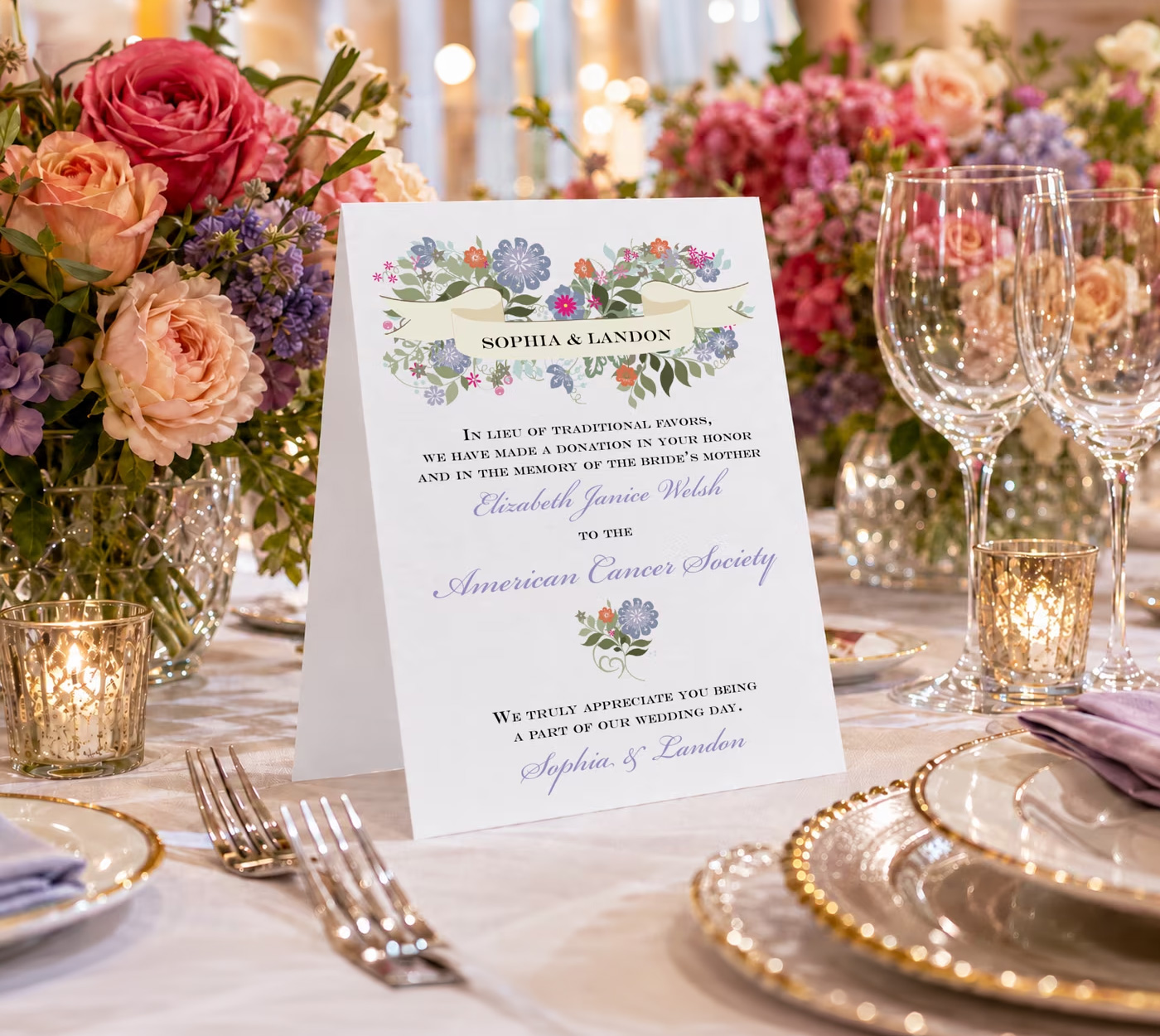 Personalized donation cards displayed on a wedding reception table